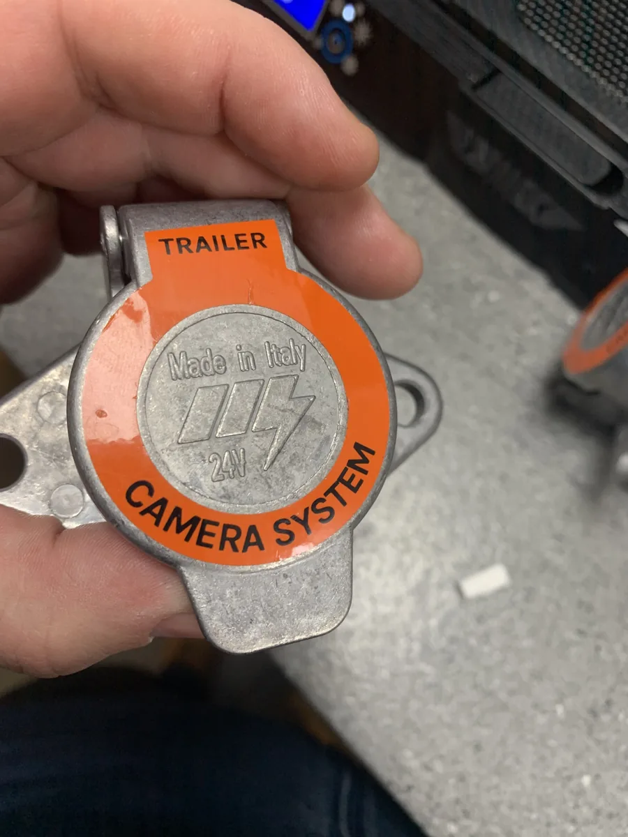 The trailer-end camera socket with an orange label reading Trailer, Camera system